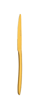 Gold-colored knife on a white background