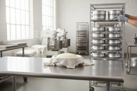 Commercial bakery dough pan with risen bread