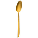 Gold spoon on a white background