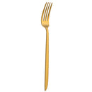 Gold fork on a white background