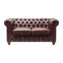 Canapé deux places Chesterfield en cuir rouge antique