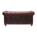 Canapé deux places Chesterfield en cuir rouge antique